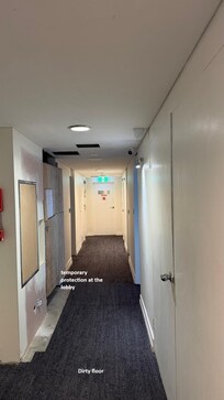 Messy corridor and lift lobby