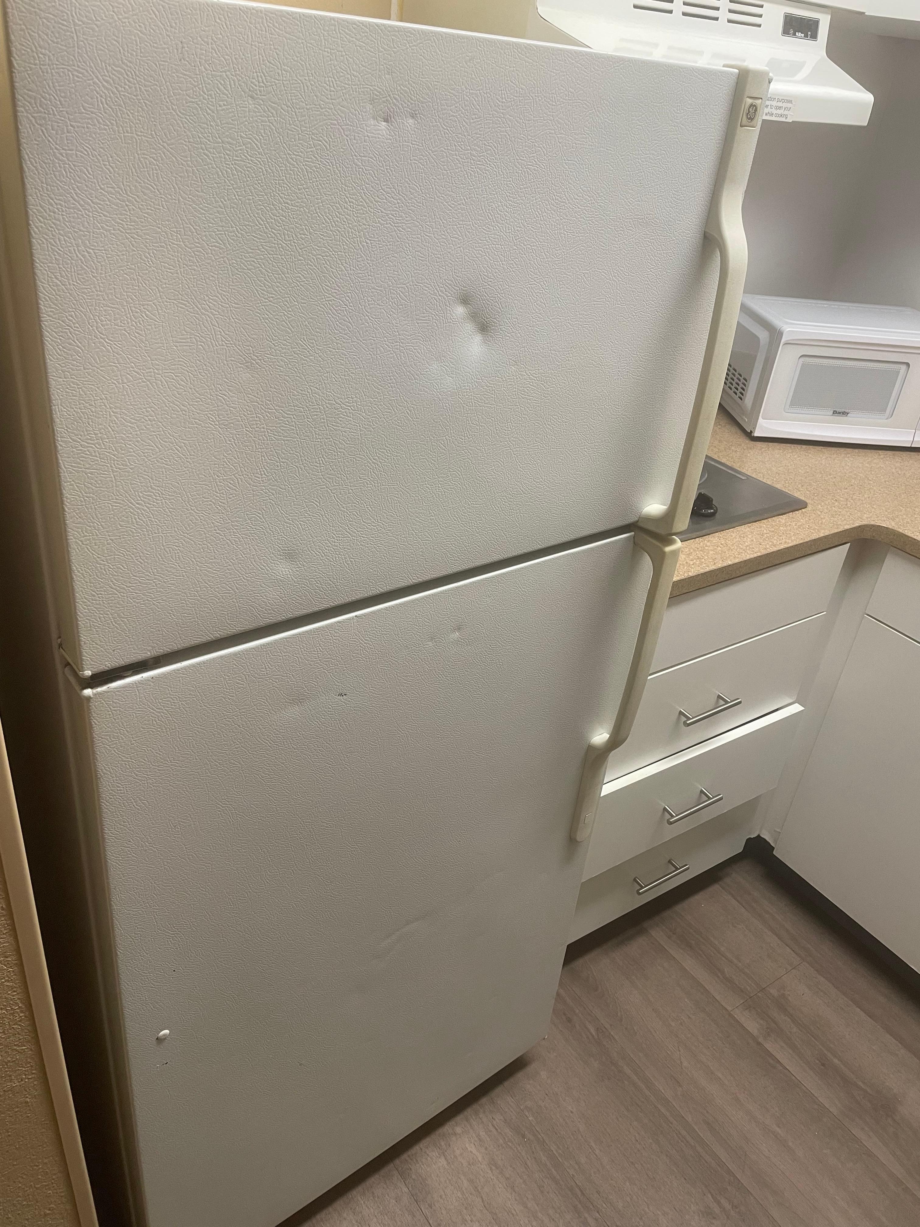 Refrigerator looked like it rolled down a mountain 