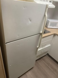 Refrigerator looked like it rolled down a mountain