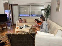 Granddaughters relaxing in the living area.