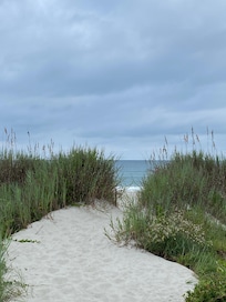 Beach access steps away.