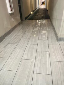 Floor outside our door wet from fire extinguisher system. However they did mop, floor was not fully dry outside or inside our room.