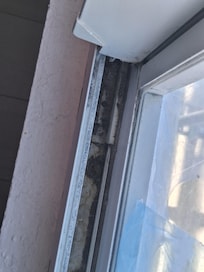 dirt on window sill.