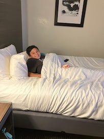 Happy with his giant bed all to himself