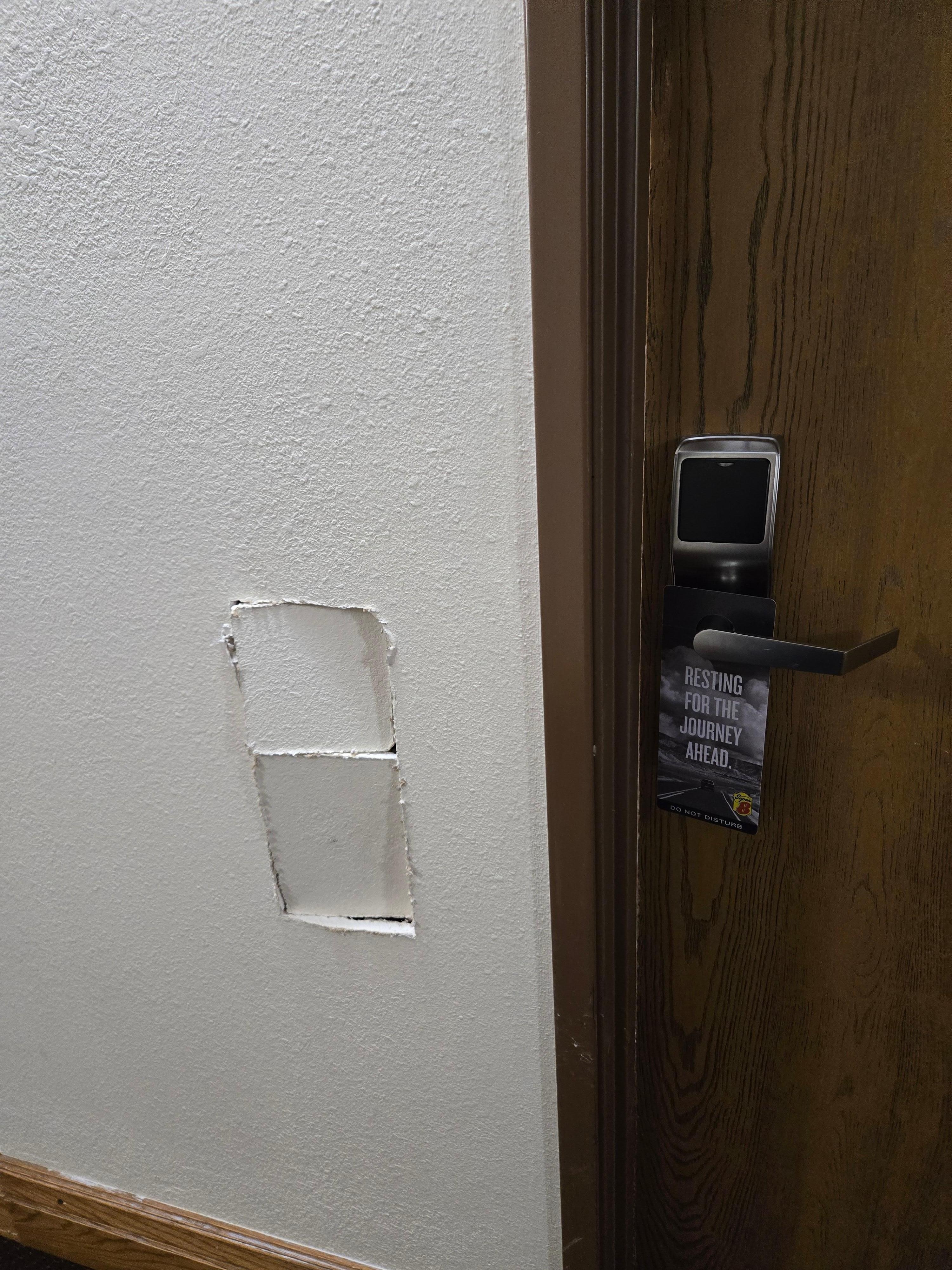 Right outside our hotel door - don't know how long the hole has been there, but no attempt to patch, just a hole into the room - I'm assuming there was a plumbing issue, because this is where the bathroom sink is. 