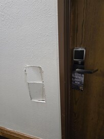 Right outside our hotel door - don't know how long the hole has been there, but no attempt to patch, just a hole into the room - I'm assuming there was a plumbing issue, because this is where the bathroom sink is.