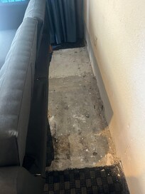 Floor behind the “sleeper sofa”. No mattress just hard and dirty cushions. Had to request sheets from front desk. Very uncomfortable to sleep on!