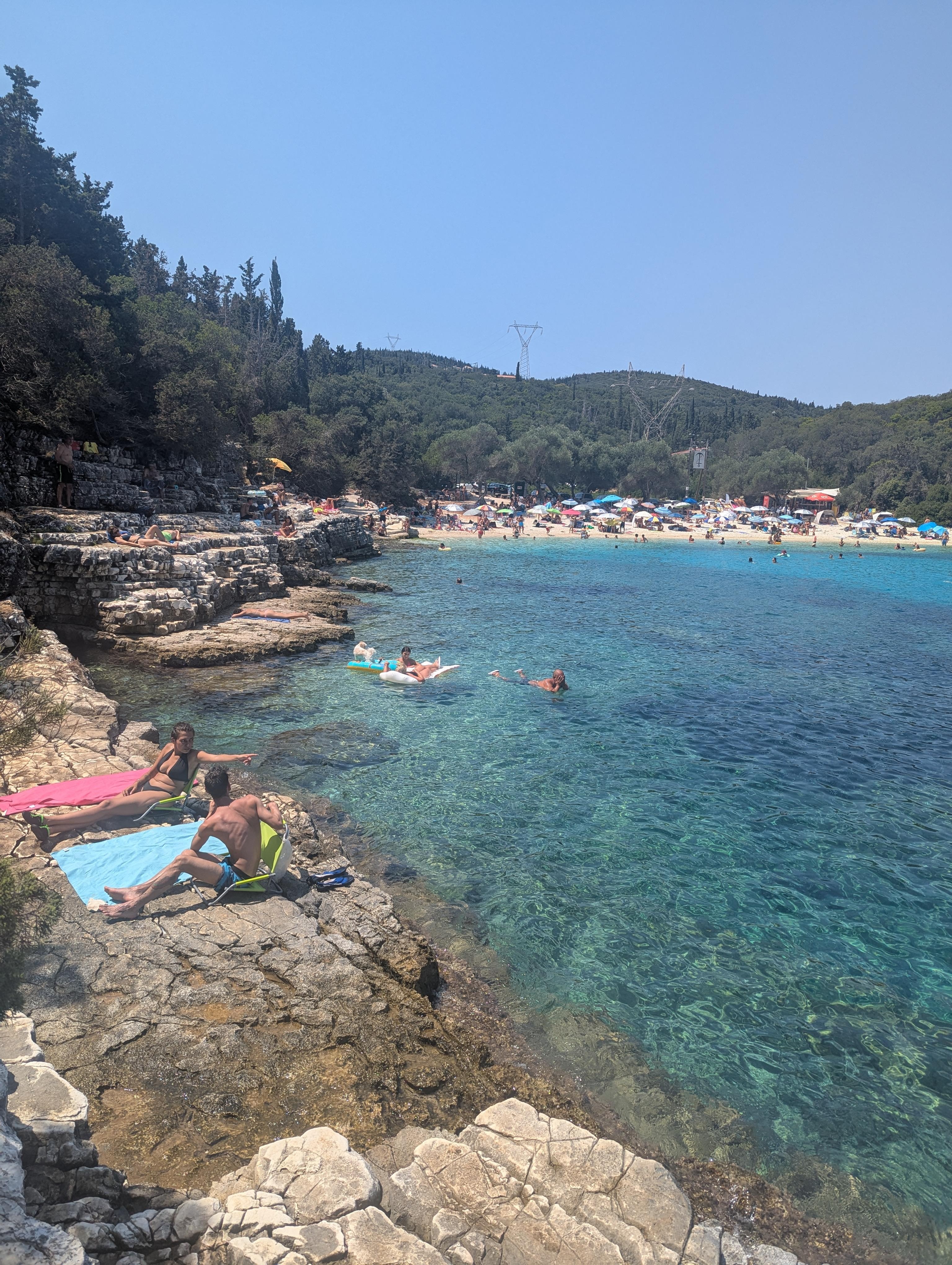 Emplisi beach - rocks accessible from the road down a short (10m) path from the road, with a hand rope