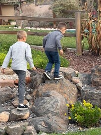 Keeping ourselves busy while we’re waiting for family pictures. Lovely landscaping.