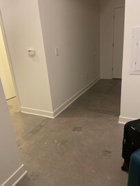 Our initial impression: bare floors and a completely empty room (ended up being the laundry, so acceptable, but this was what we saw first.