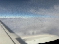 There was no picture taken of the outside. There is building rafters or structures everywhere. No pretty blue light and inviting entrance, it took two of us to turn the round door.