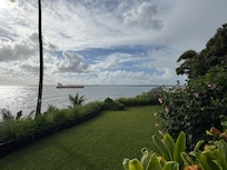 Ship coming in right past the house!