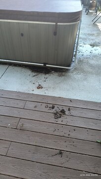Rusty metal from where hot tub top was changed. Safety hazard to step on