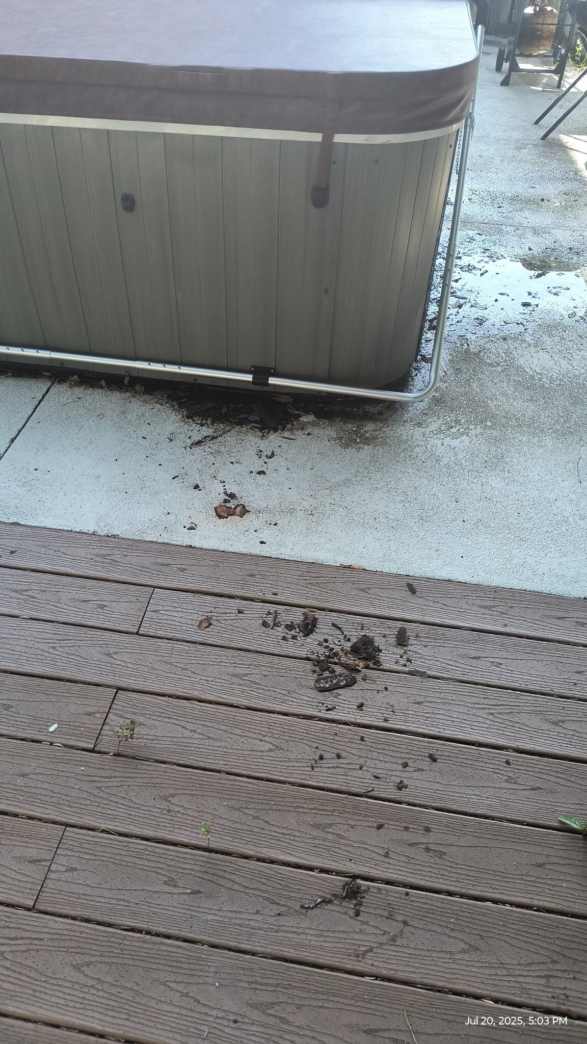 Rusty metal from where hot tub top was changed. Safety hazard to step on