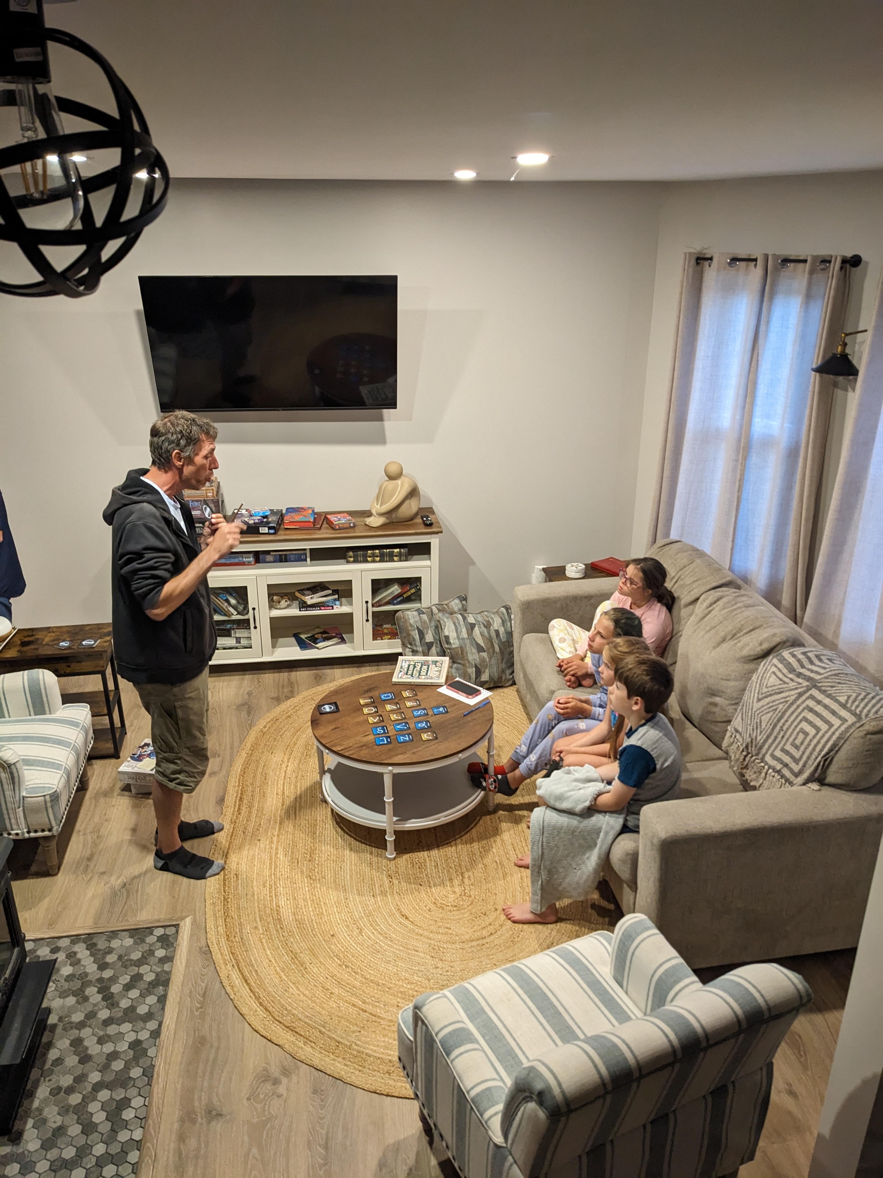 View of the living room coming down the stairs 