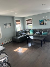 Upstairs kitchen and lounge for guests. Also had towels and beach chairs for the guests use.