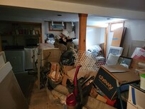 another view, junk everywhere in basement
