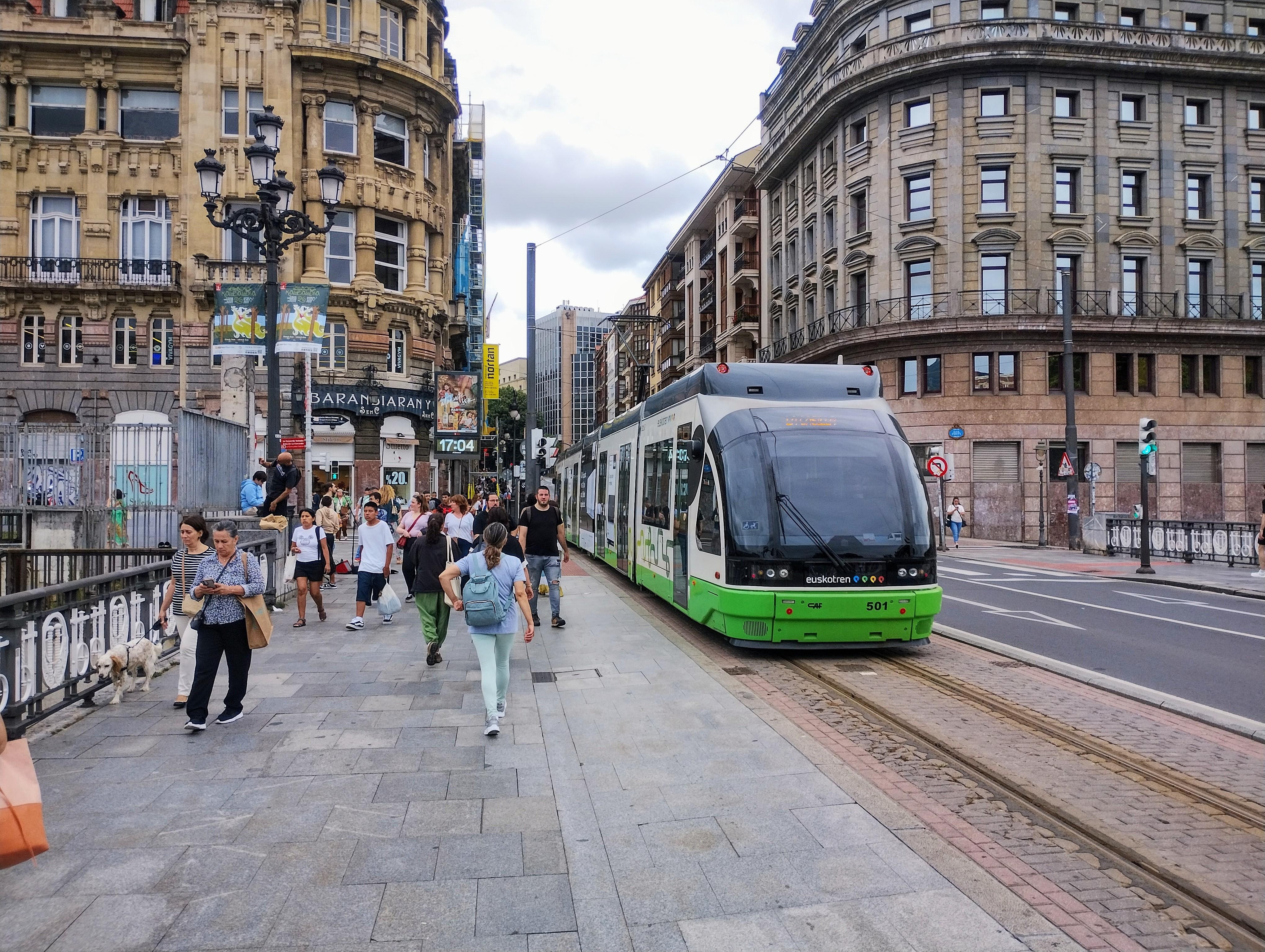 Tram crossing Nervión river bridge