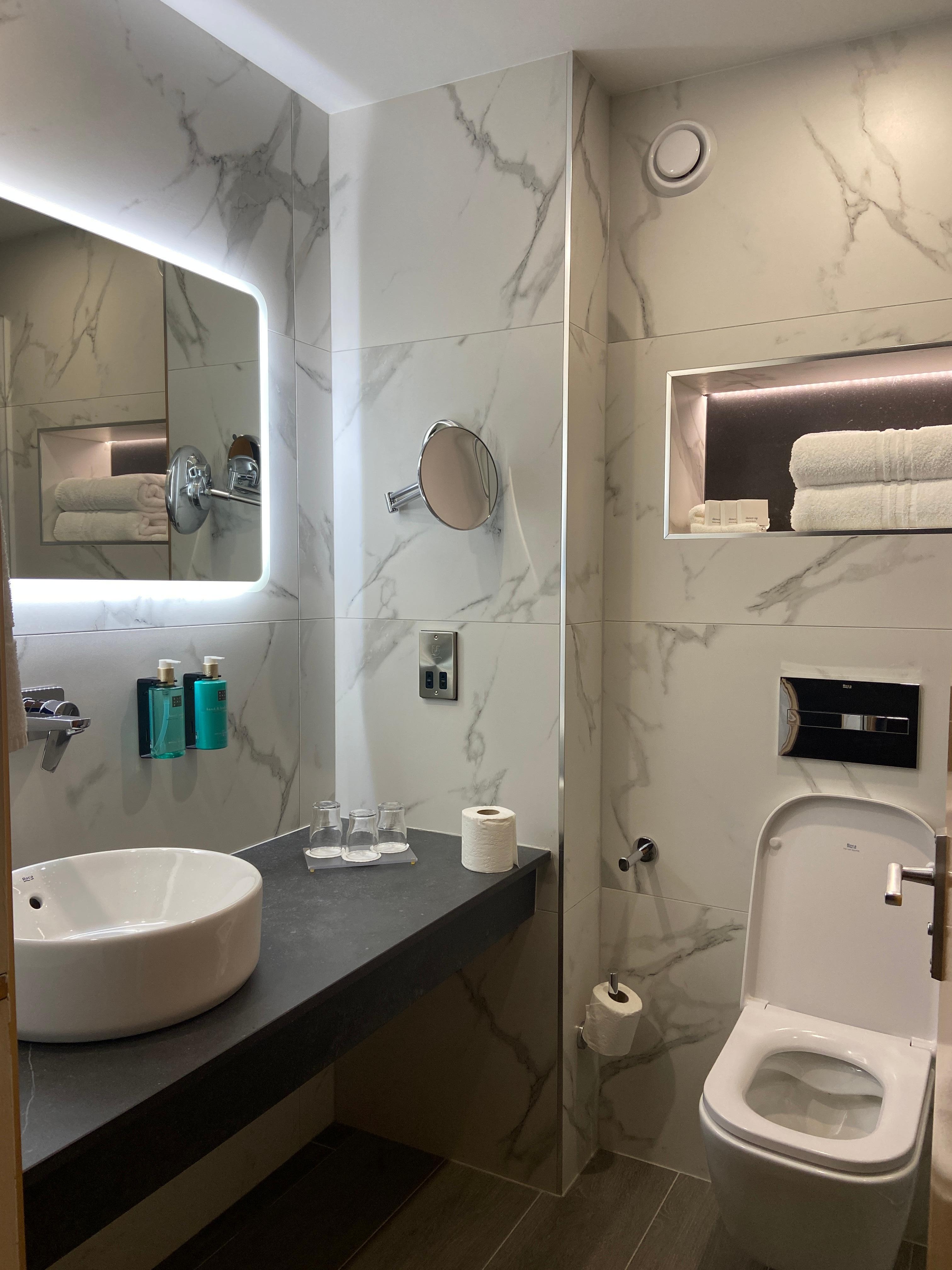 Large clean bathroom with big shower 