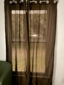 Front bedroom see thru curtain taken at 8:42 pm