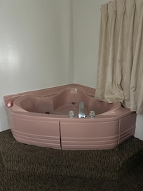 Snazzy pink jacuzzi tub