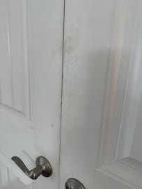 Most doors had dark hand print smudges all over