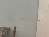 Walls all over the house beat up