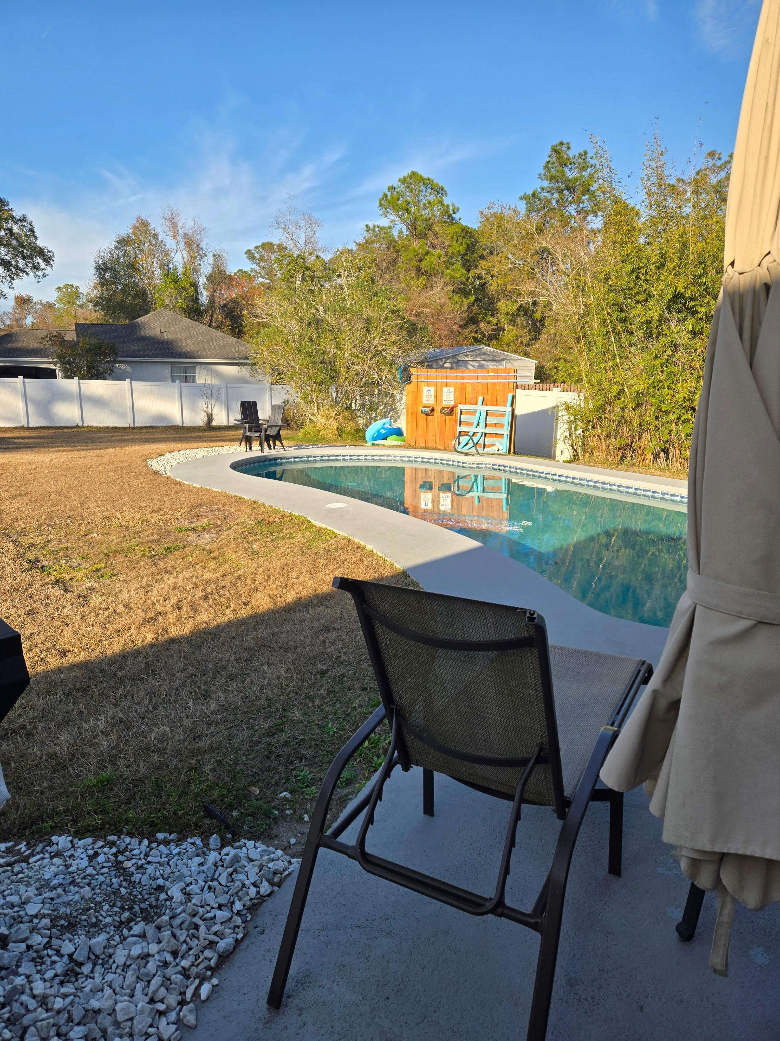 A beautiful backyard and pool