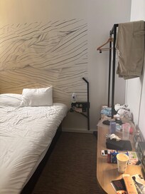 One side of bed (detailing storage etc)