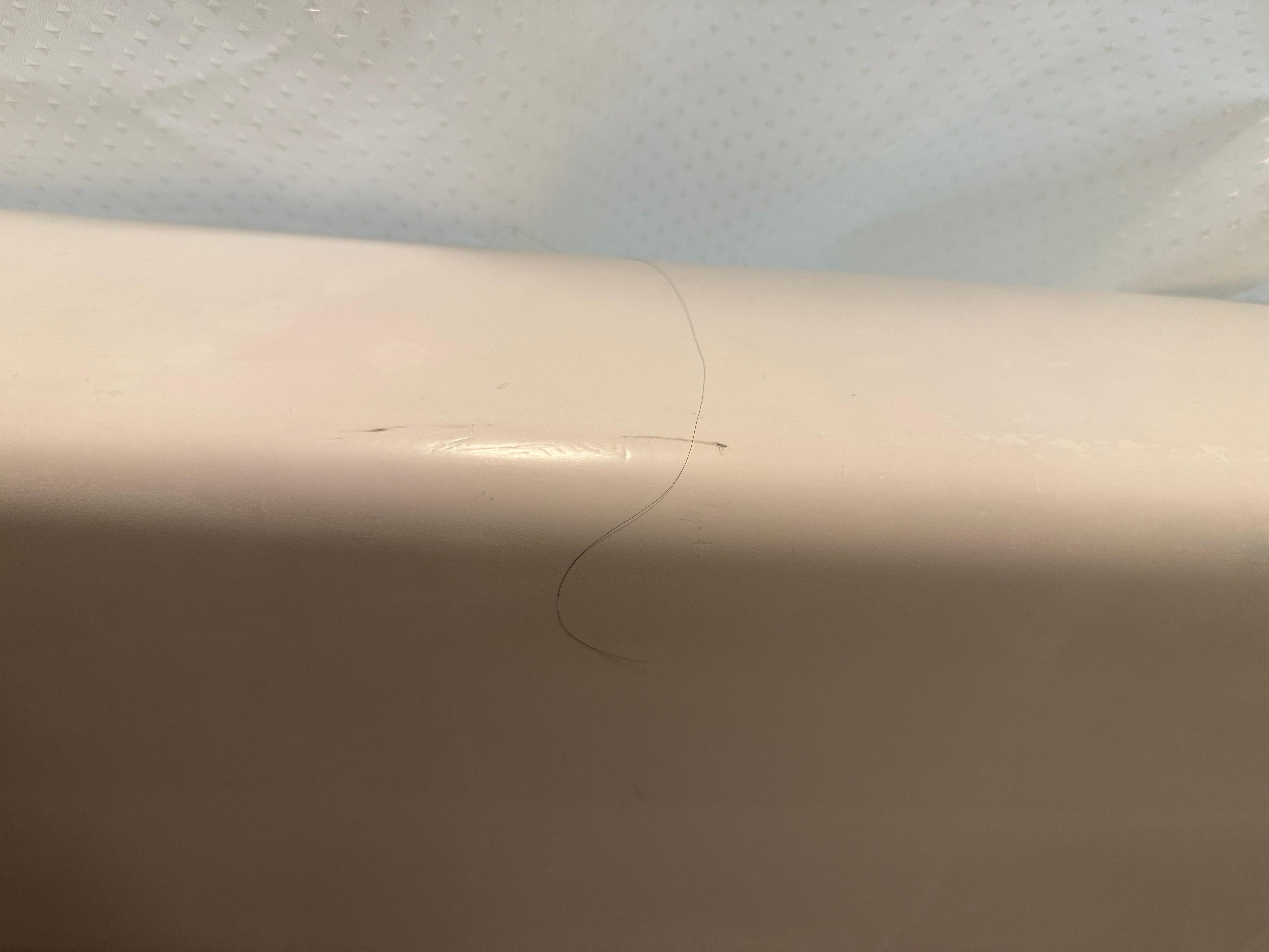 Hair inside and outside of the tub