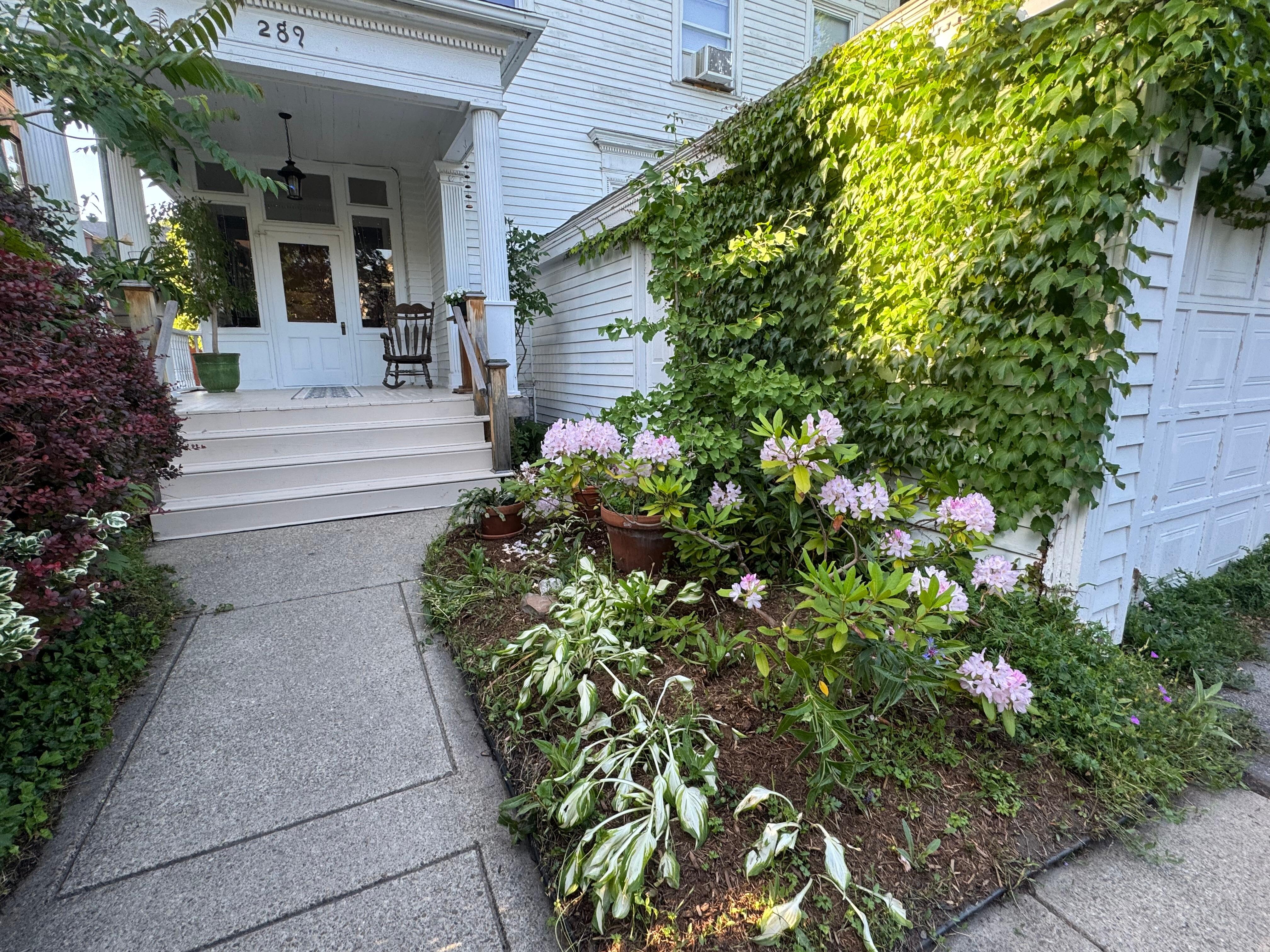 An inviting entrance and off street parking