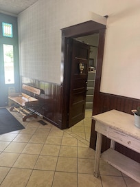 The entrance to the barber shop as seen from the kitchen.