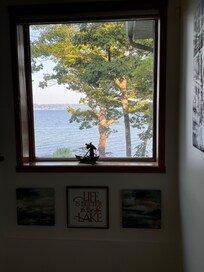 Picture window at the top of the stairs.