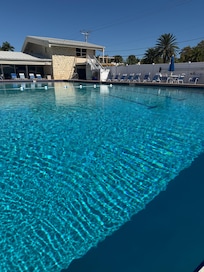 Picture of the pool that is literally right next door to the unit.