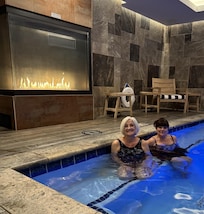 VERY NICE hot tub with fireplace, robes and slippers.