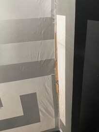 Peeling wallpaper.