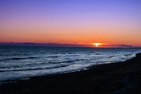 The beach is a short walk over the road and beautiful