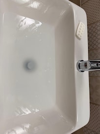Washroom sink is clogged.