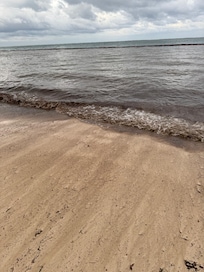 The water is boiling seaweed and trash. You can even see that the water behind the net is cleaner