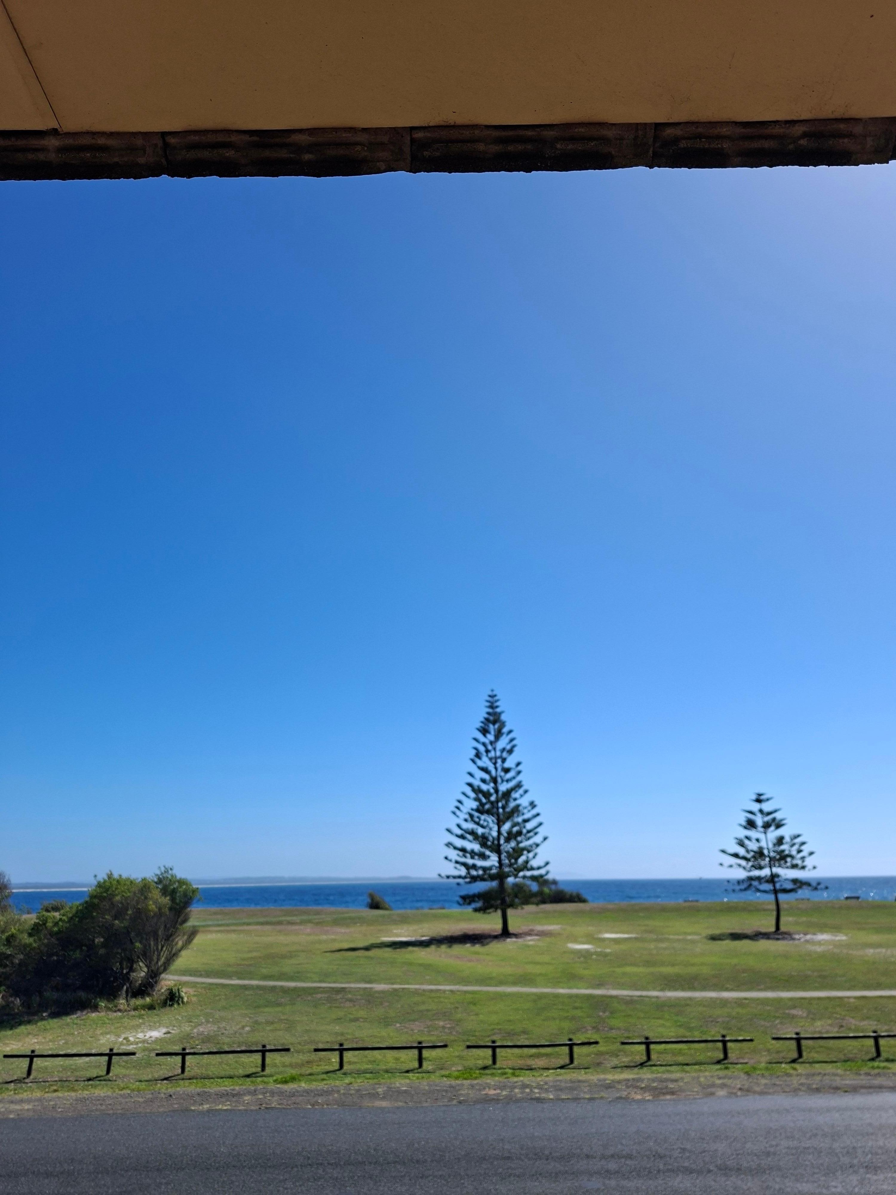 View from balcony & directly across the road is " The Tanks" , a popular rock pool for swimming. 