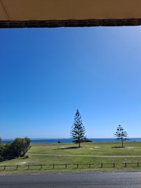 View from balcony & directly across the road is " The Tanks" , a popular rock pool for swimming.