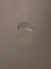 Hole in wall from front door