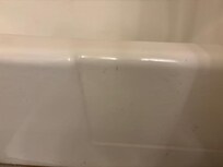 Dirt on outside of bathtub