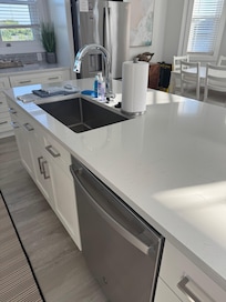 Open concept in kitchen and lounging area