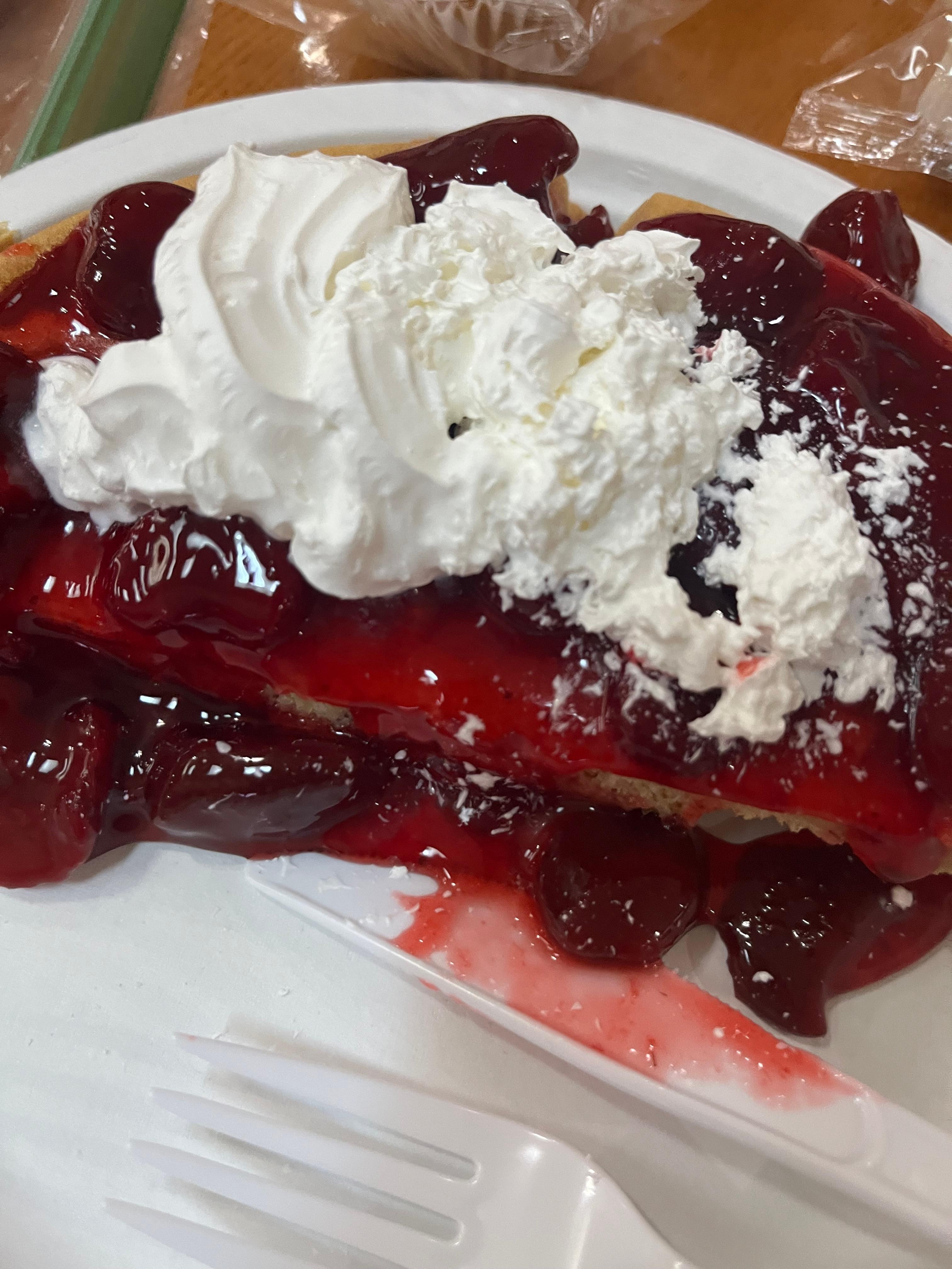 Waffles with strawberry and whip cream 