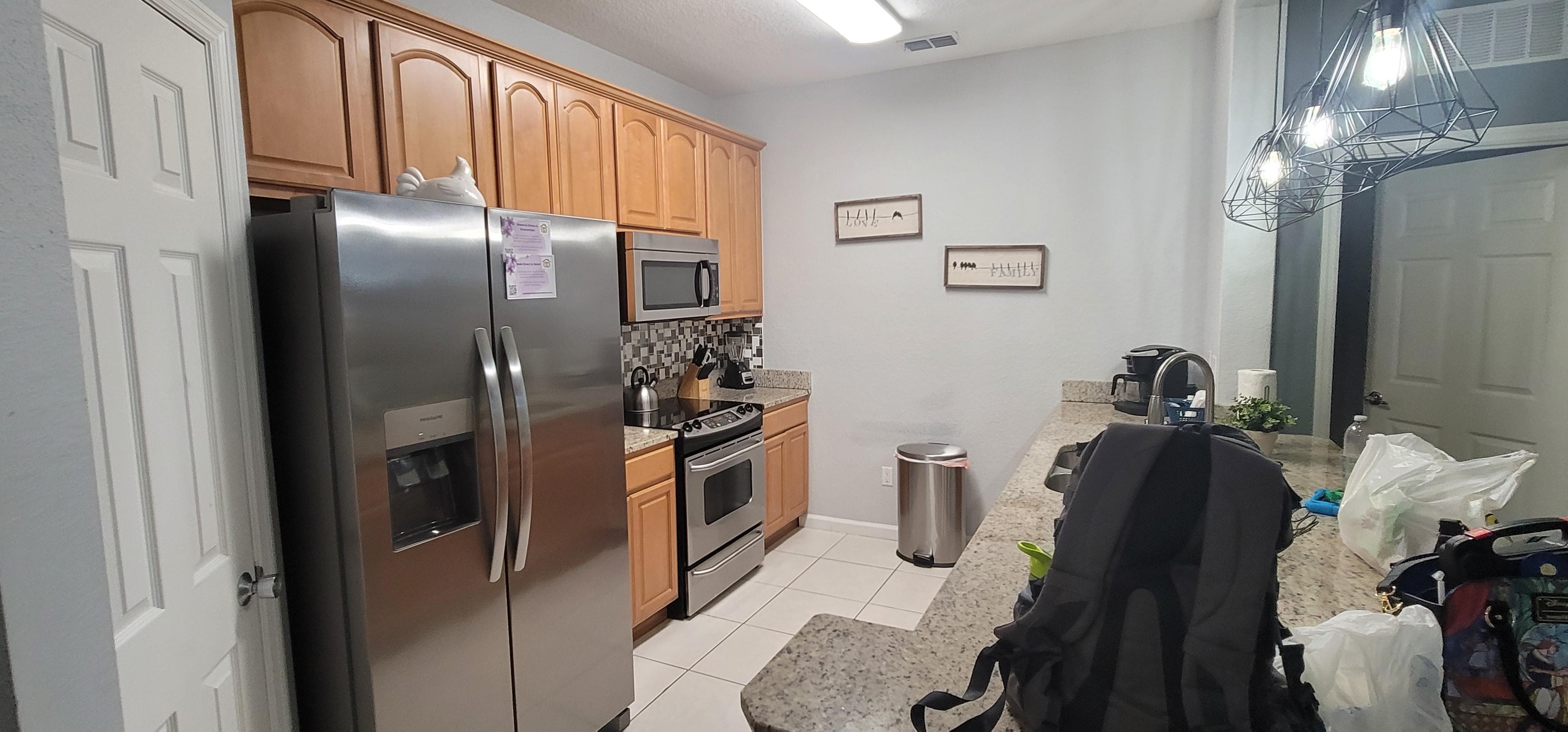 Kitchen area had a nice size fridge, plenty of dishes and silverware. Coffee pot and keurig. Dishwasher, mic, and stove.