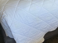 Yellow stain on bed sheet