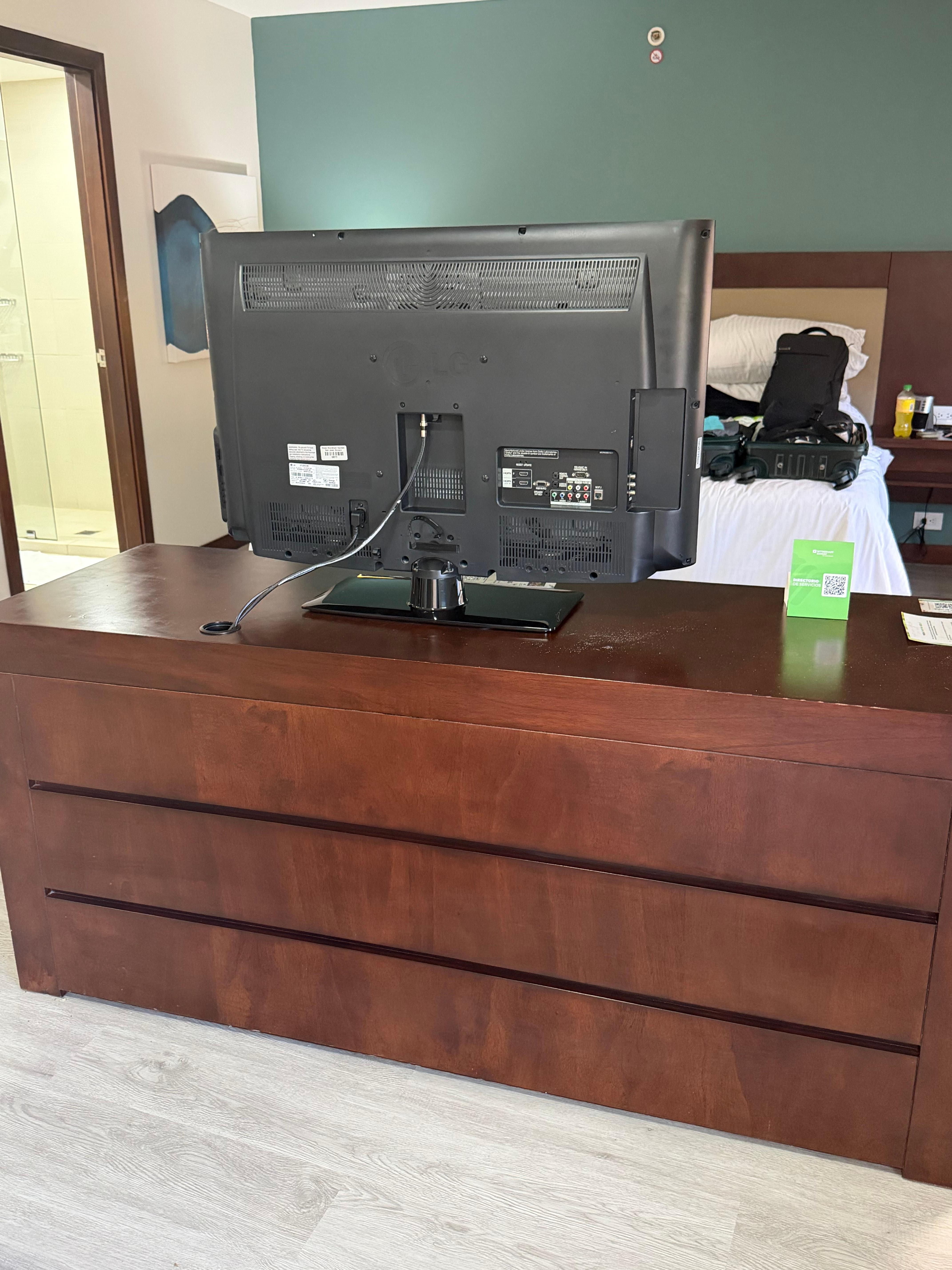 TV is in a fixed position. You can only watch it from your bed.