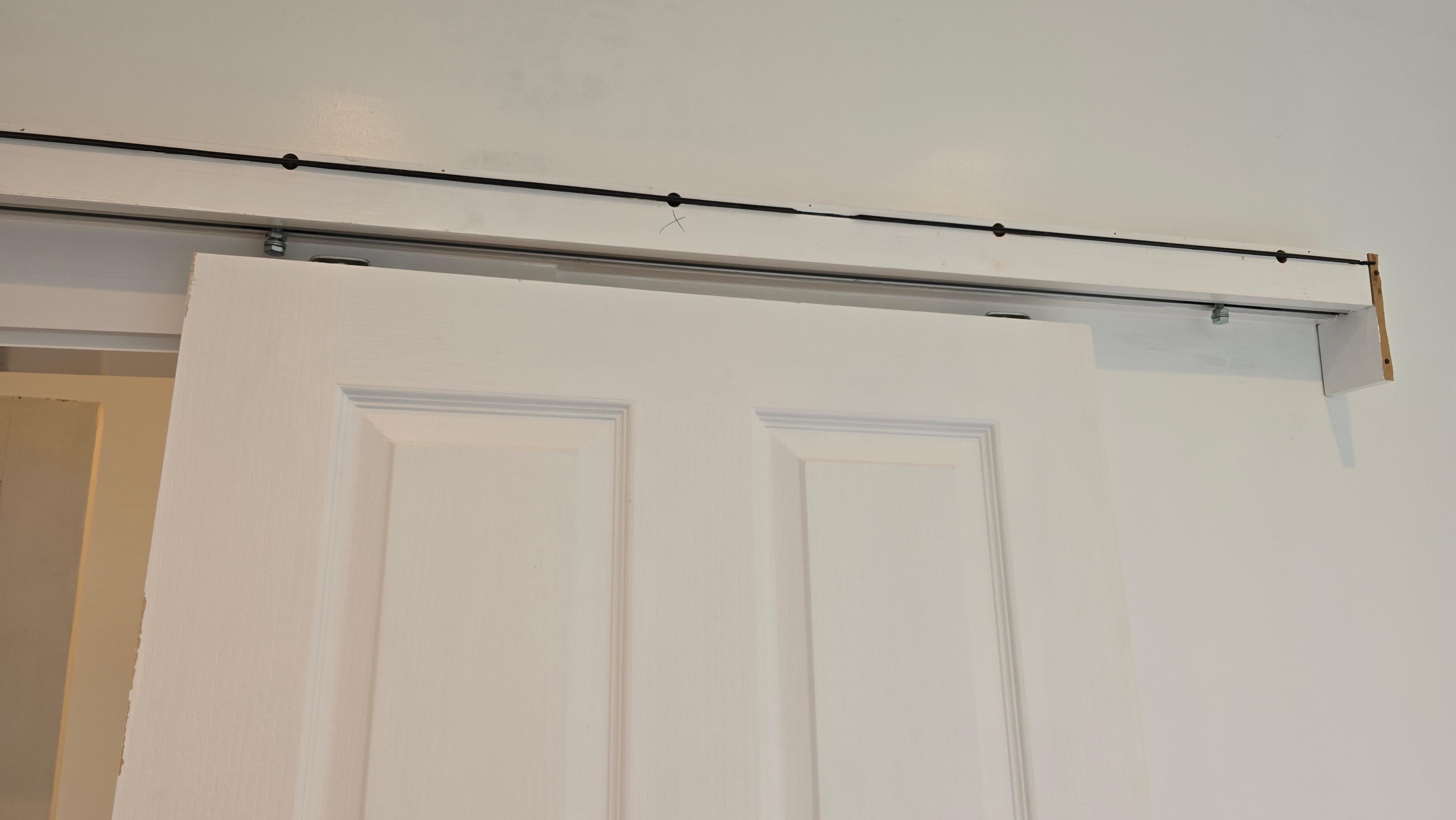 Unsecured bolt on sliding washroom door