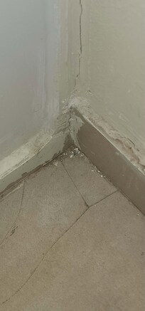 Cracked tiles in the bathroom.